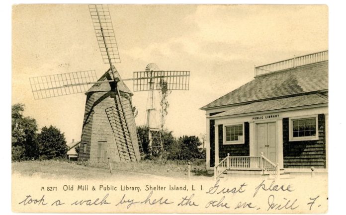 Postcard of old windmill and library